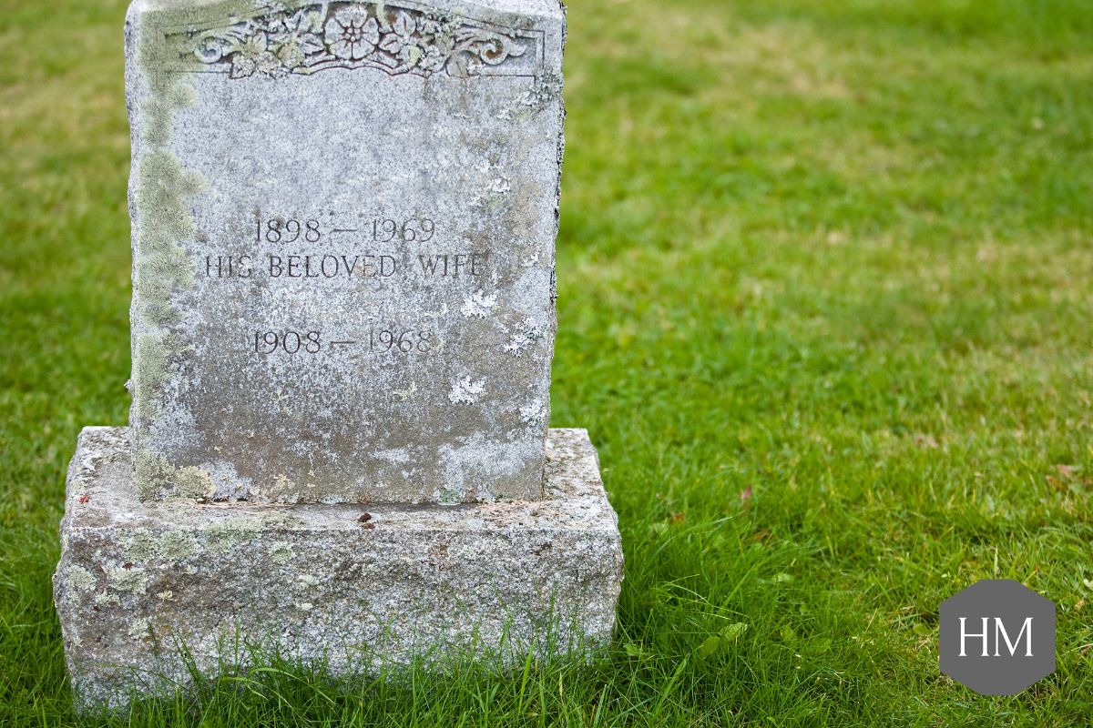Headstone with epitaph "His beloved wife"