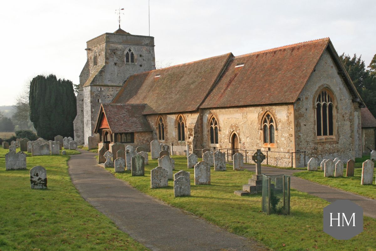 Church and churchyard showing headstones